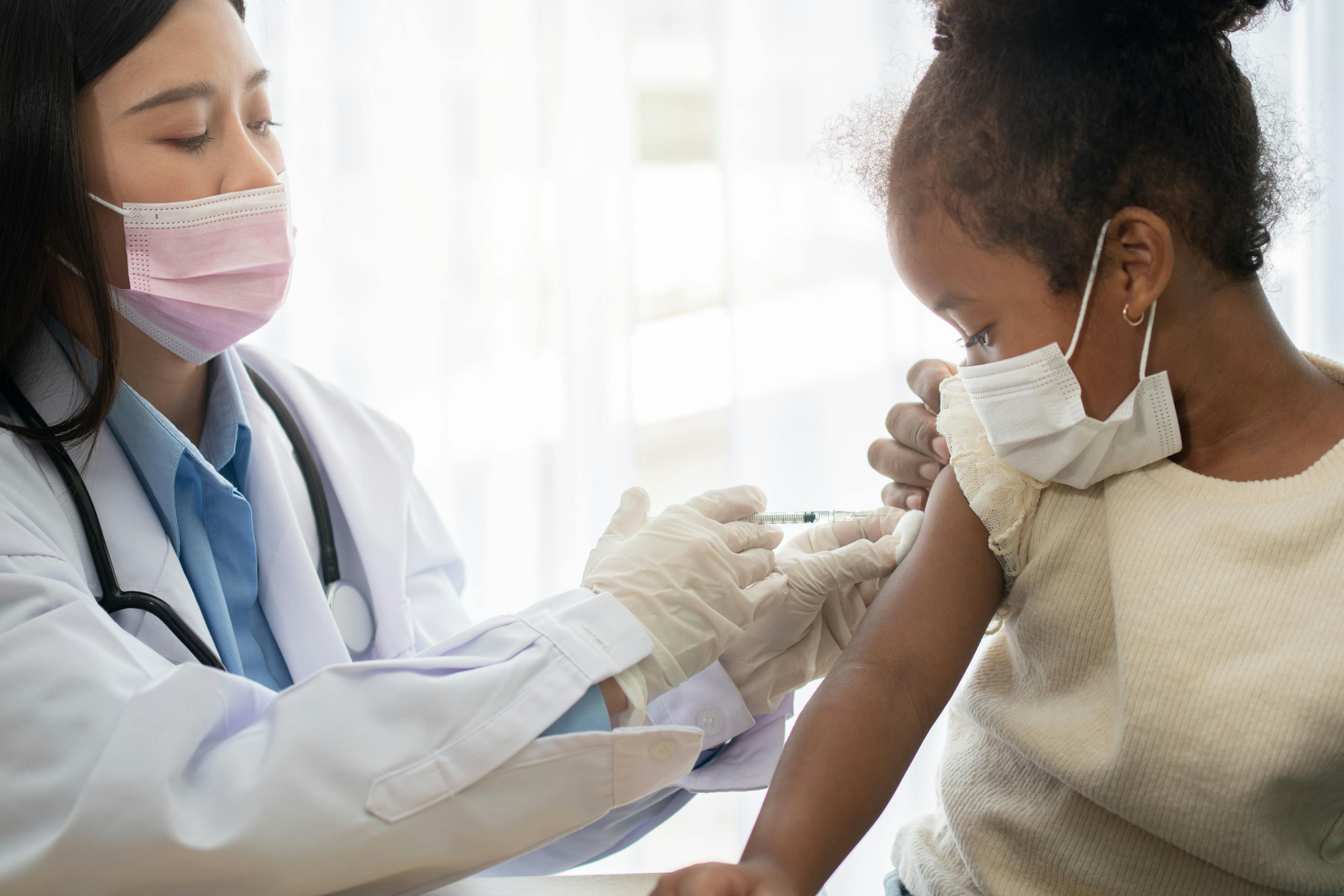 Pfizer Vaccine Efficacy in Children and Adolescents During Delta and Omicron