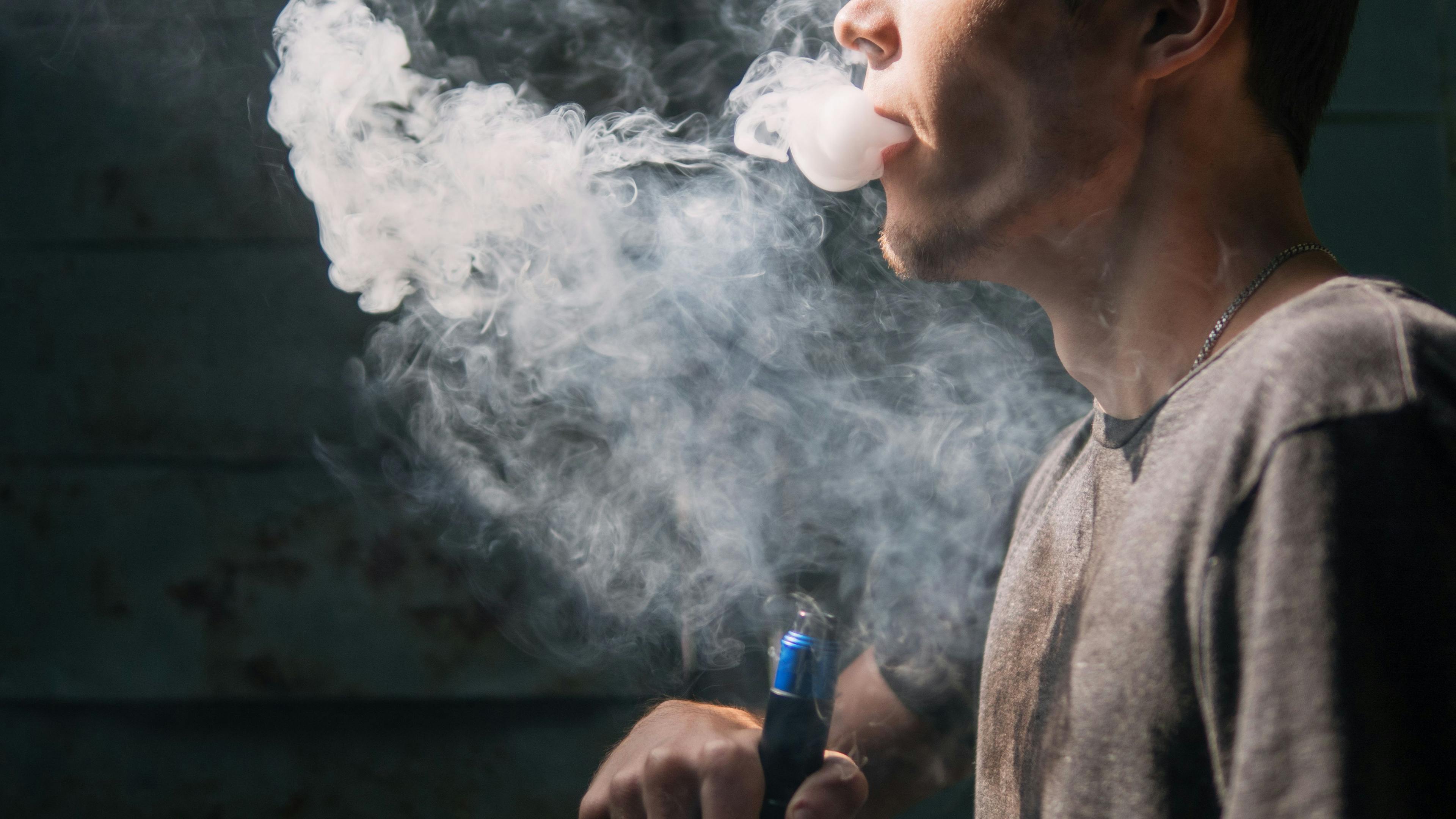 E-Cigarette Users at Higher Risk for Symptomatic COVID-19
