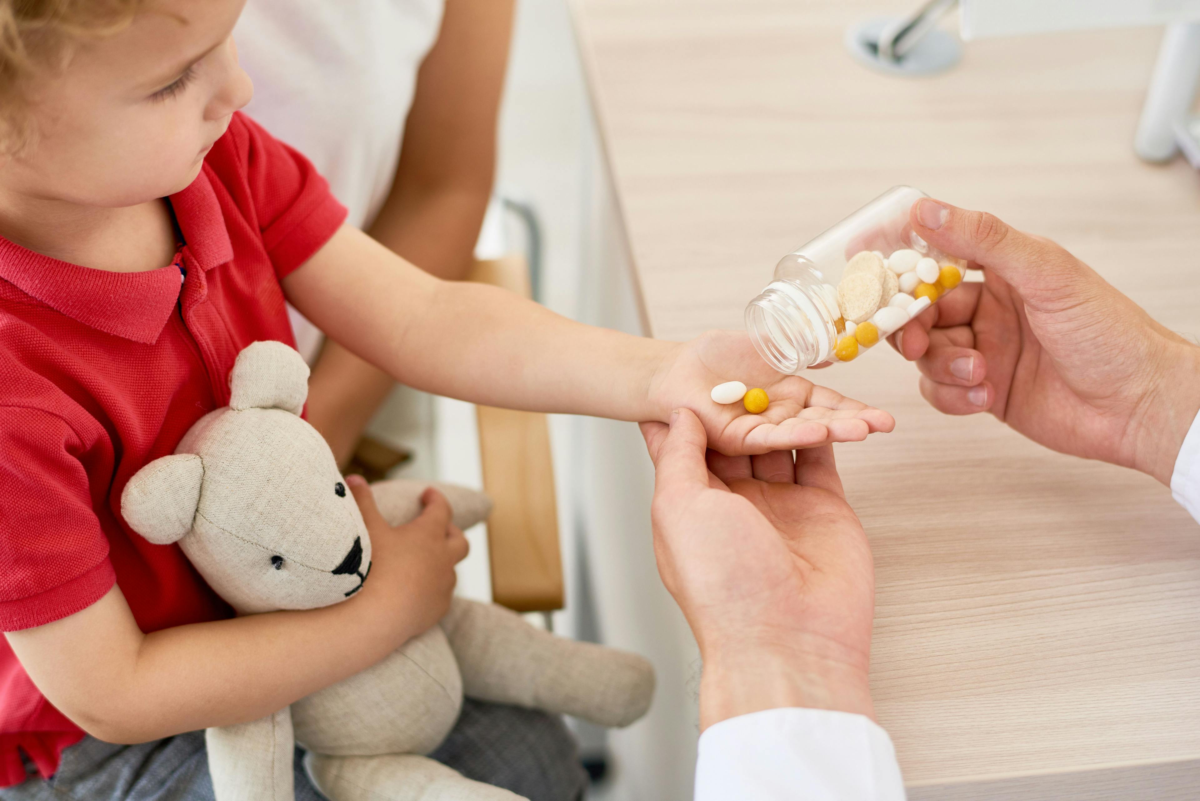 At what rates were children hospitalized with COVID-19 prescribed antibiotics?