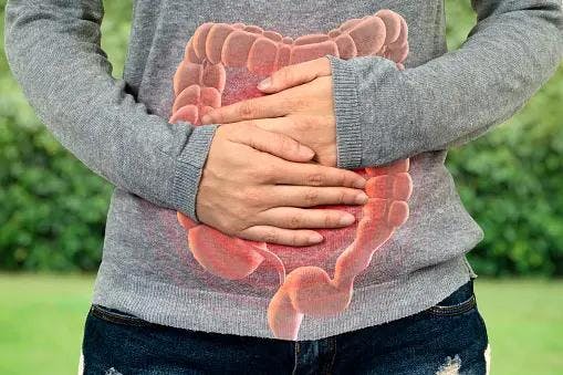 Person with gastrointestinal pain | Image credits: Unsplash